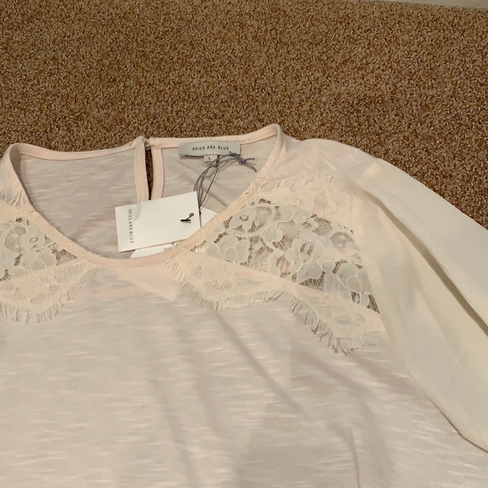 BRAND NEW - Women’s cream blouse